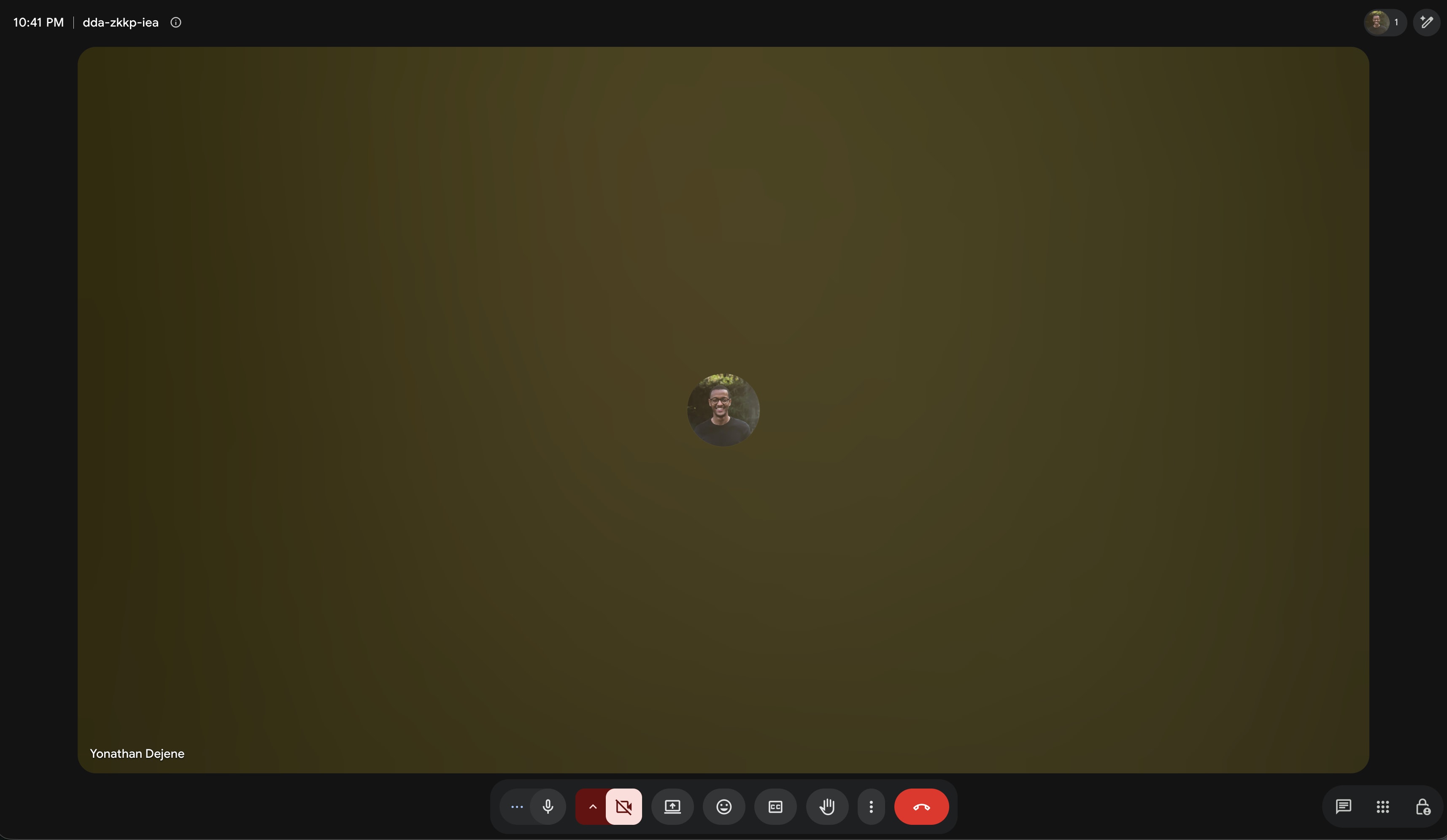Google Meet with Yoni's profile photo, camera off, and call controls below