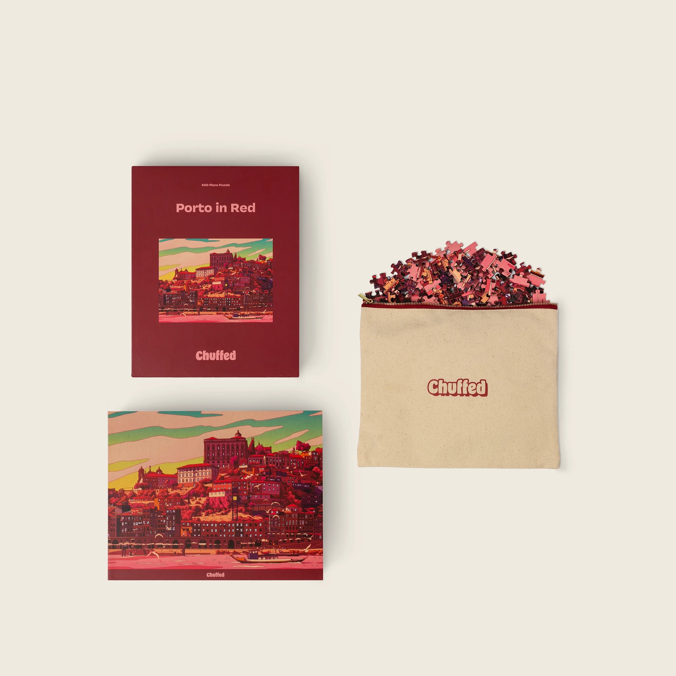 Porto in Red box, art print, and pouch filled with puzzle pieces