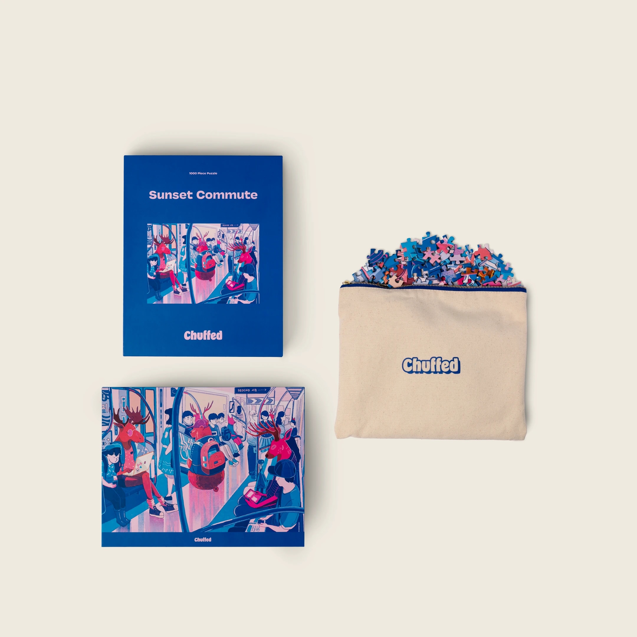 Sunset Commute box, art print, and pouch filled with puzzle pieces