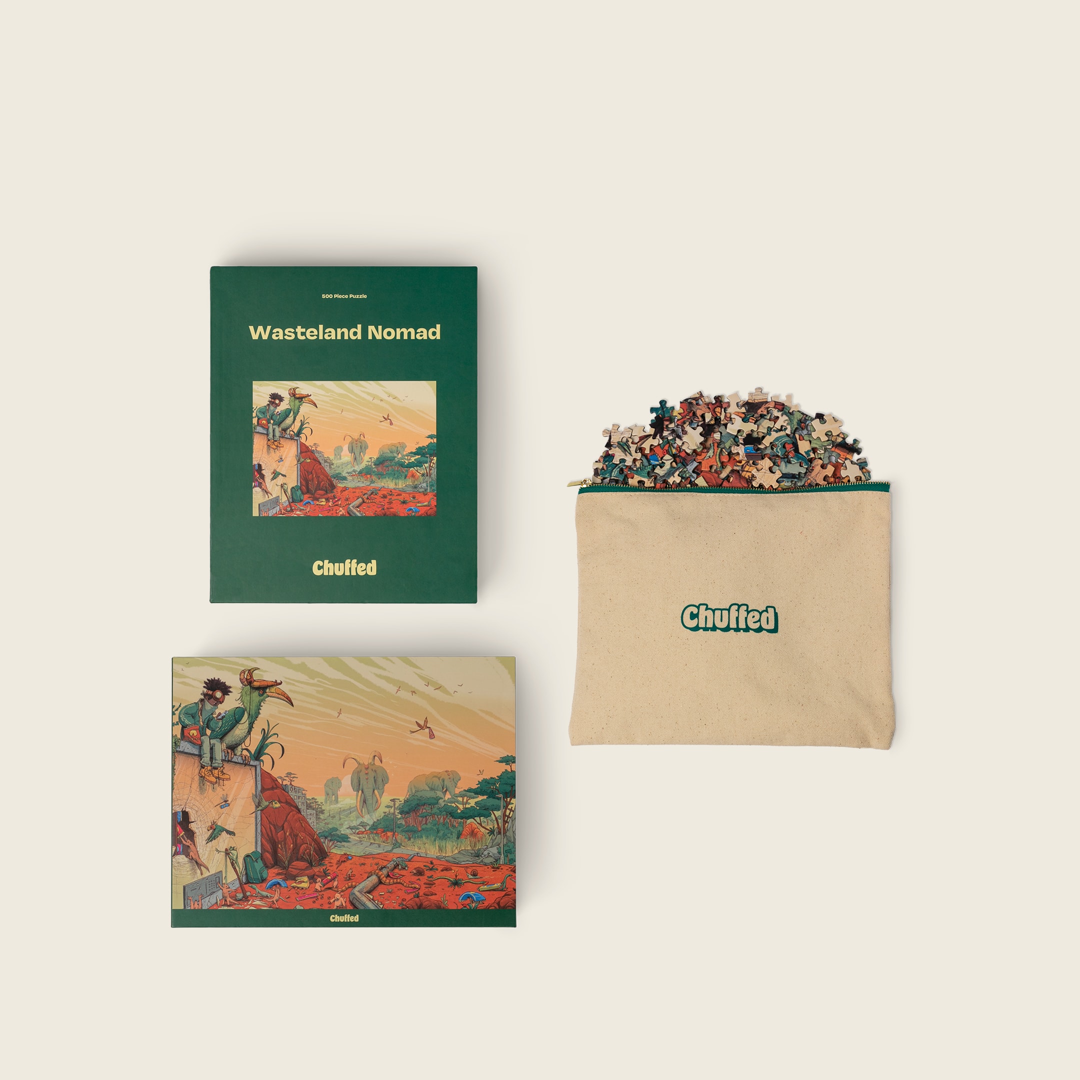 Wasteland Nomad box, art print, and pouch filled with puzzle pieces